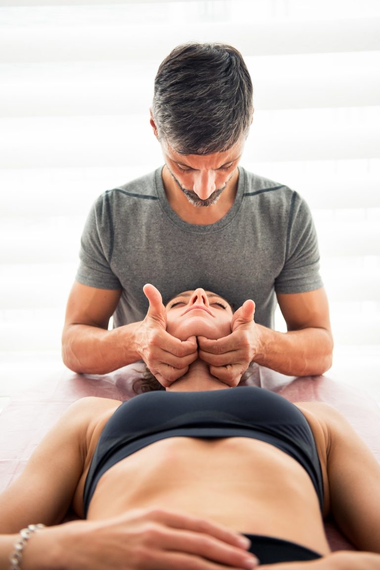 Osteopathic manipulation on digastric muscle